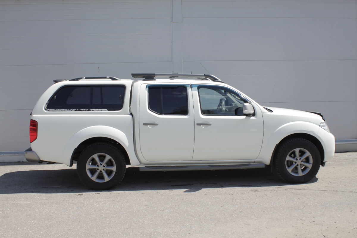 Nissan Navara (Frontier), III (D40) Рестайлинг 2.5d AT (190 л.с.) 4WD