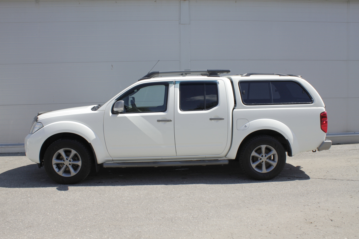 Nissan Navara (Frontier), III (D40) Рестайлинг 2.5d AT (190 л.с.) 4WD